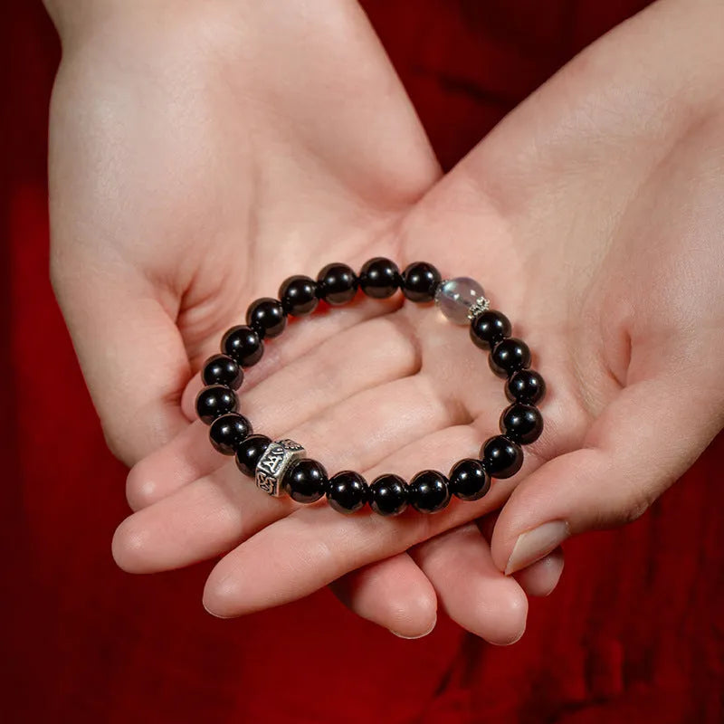 8mm diameter obsidian zodiac bracelet with hand-carved animal modelling in ethnic style