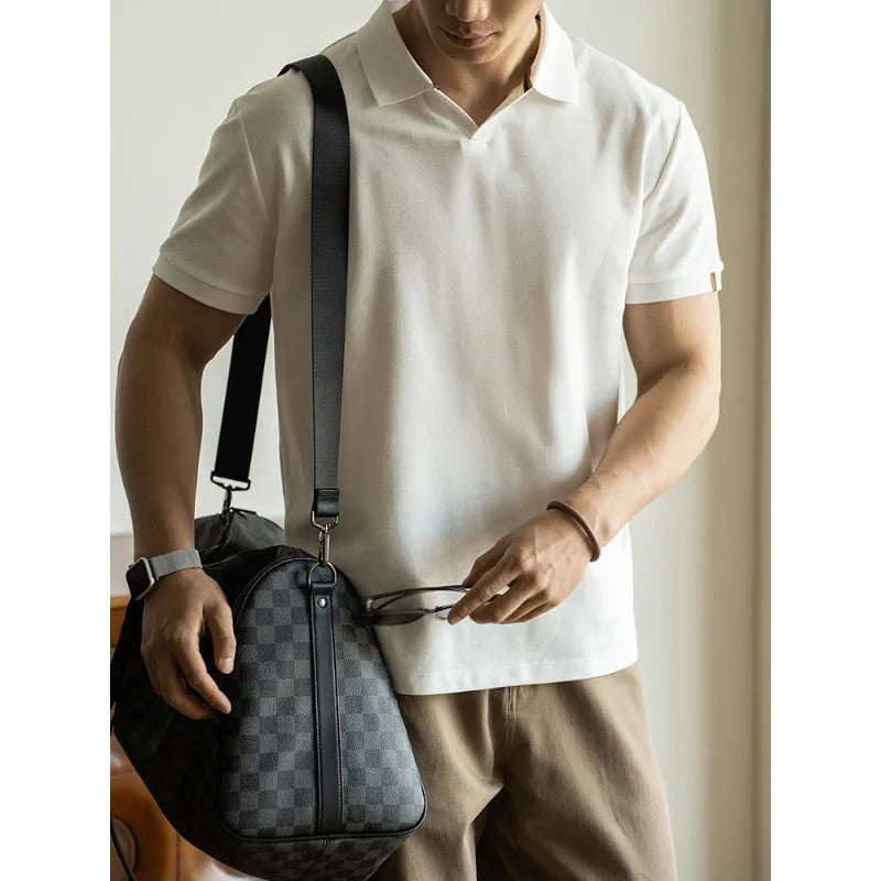 American-style cotton blend short-sleeved polo shirt in blue, shown in a regular fit for casual summer wear.