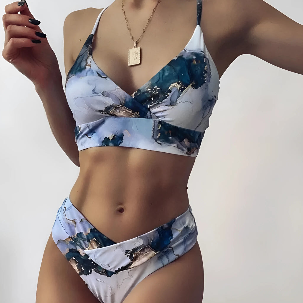 Women's high-waist bikini set with marble tie-dye print and U-neck top.
