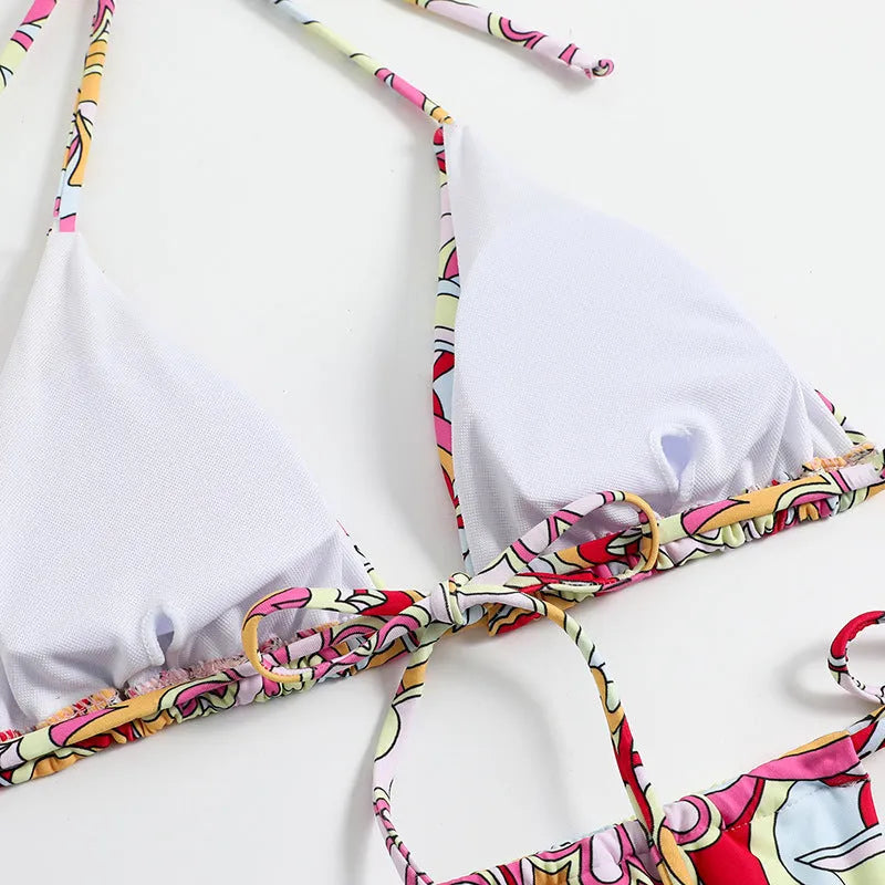 Women's triangle bikini with multicolour print and hanging neck design in separate swimwear system