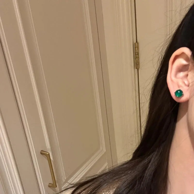 Round egg surface chalcedony stud earrings with four-claw setting in emerald green, pink purple and milk white