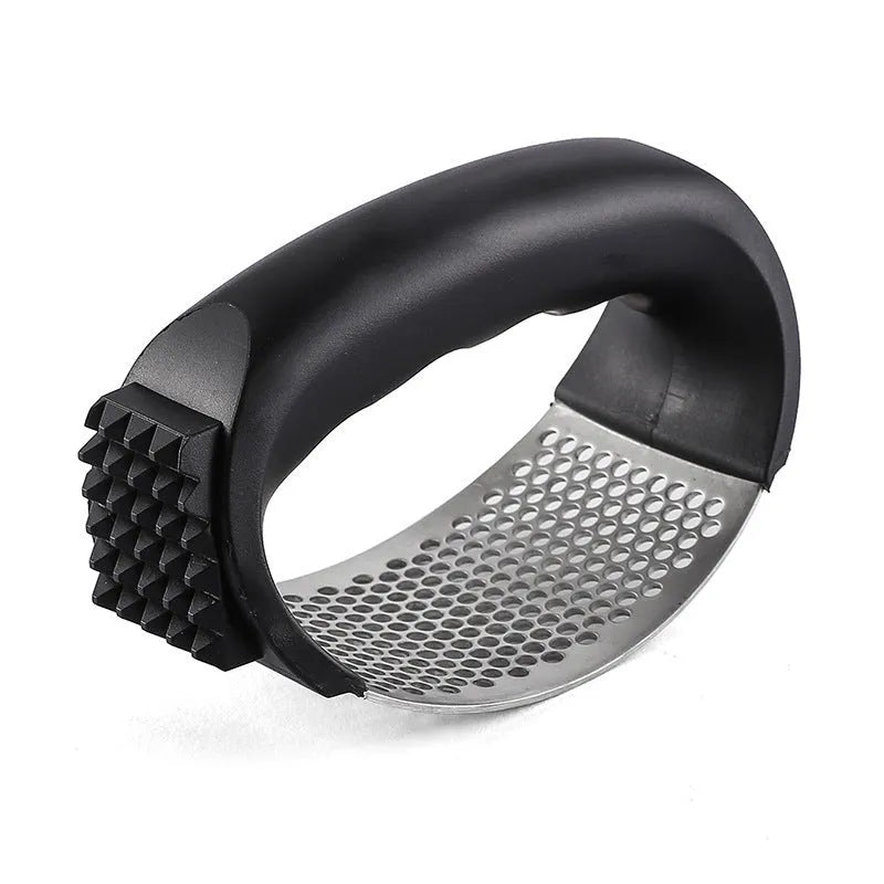 304 stainless steel garlic press in modern design with 11cm by 7cm dimensions