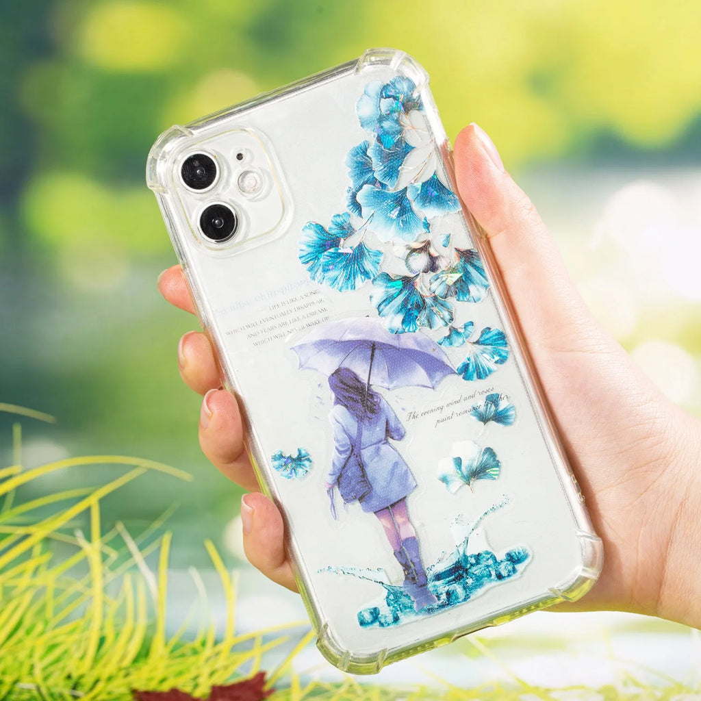 Roll of clear PET decorative stickers with repeating leaf patterns including ginkgo and maple designs.