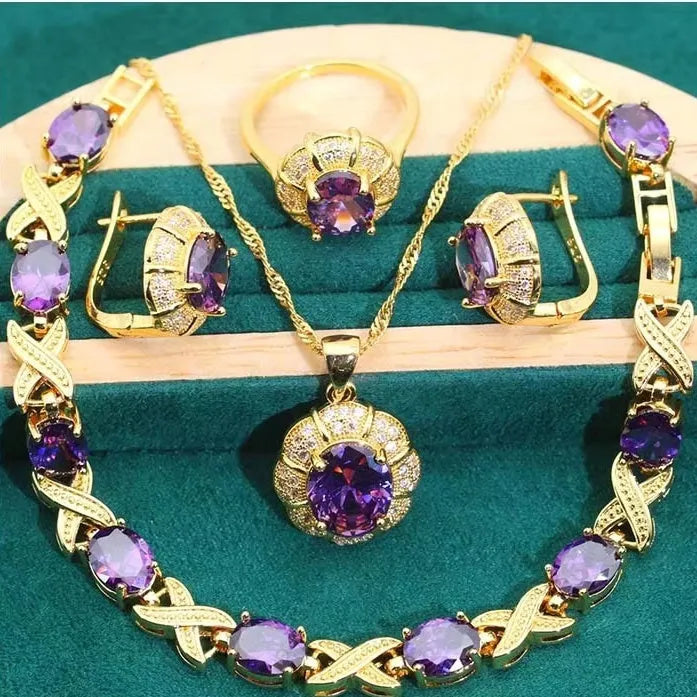 Gold plated jewellery set with multi-colour cubic zirconia stones including necklace, earrings, ring and bracelet