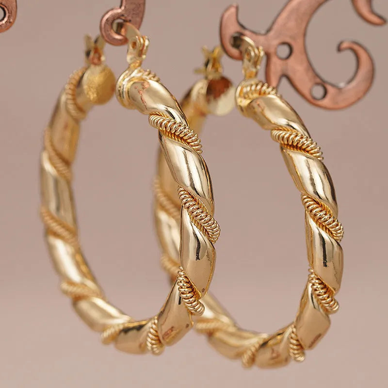 Golden geometric copper earring clip with ring and line design for women