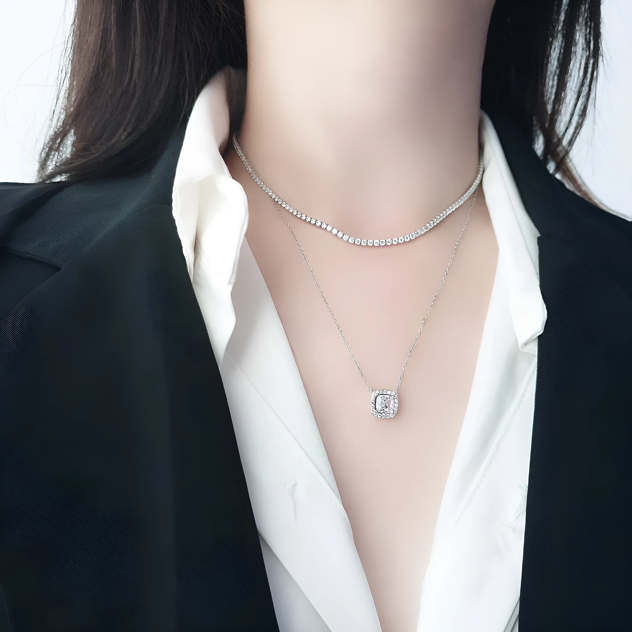 Women's sterling silver necklace with round pendant and diamond-like treatment