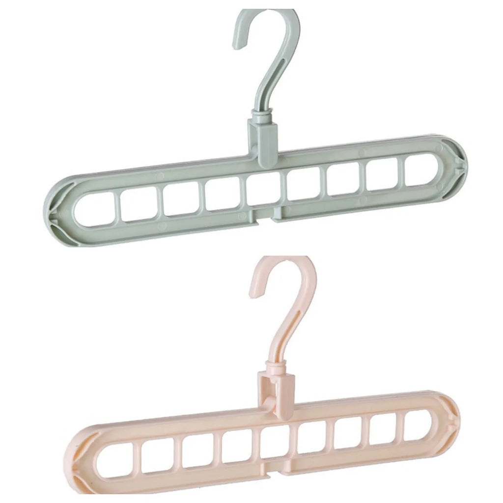 Pink or green heavy-duty plastic clothes hanger with rotating hook, shown holding a coat.