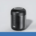 Compact black portable Bluetooth speaker showing front grille and measuring 72mm by 99mm.