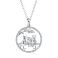 Copper necklace with electroplated four kitten pendant and cross chain.