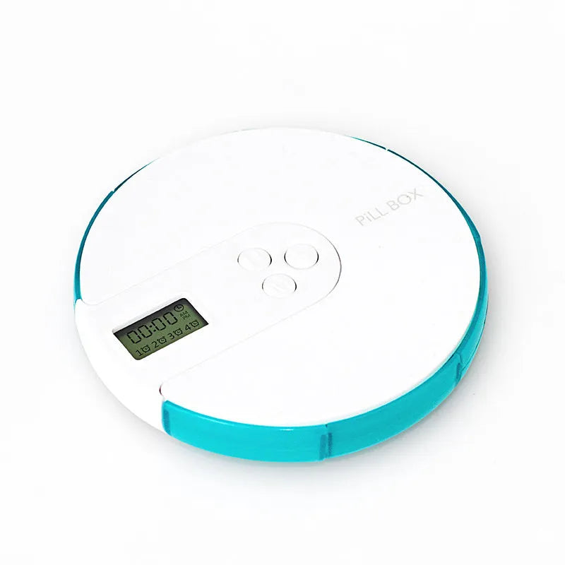 Blue 7-compartment alarm clock pill dispenser showing timer display and storage sections