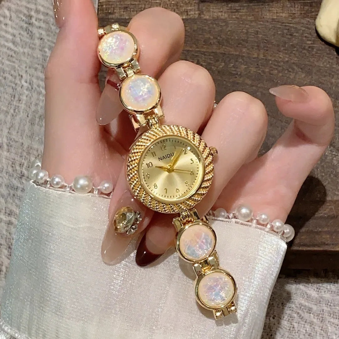 Women's quartz wristwatch with 25mm round dial and spiral crown in various colours
