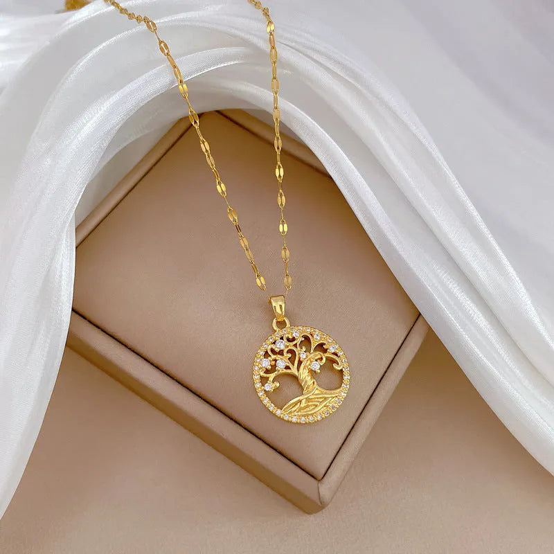 Gold-plated necklace with lucky tree pendant featuring micro-inlaid zircon and mother pearl shellfish centrepiece on adjustable chain