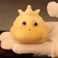 Solid bamboo carving of a cute style Crown Princess Toad ornament on display