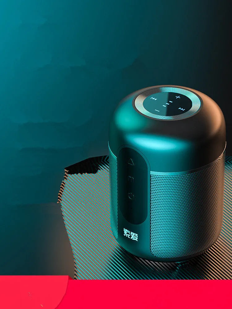 Compact black portable Bluetooth speaker showing front grille and measuring 72mm by 99mm.
