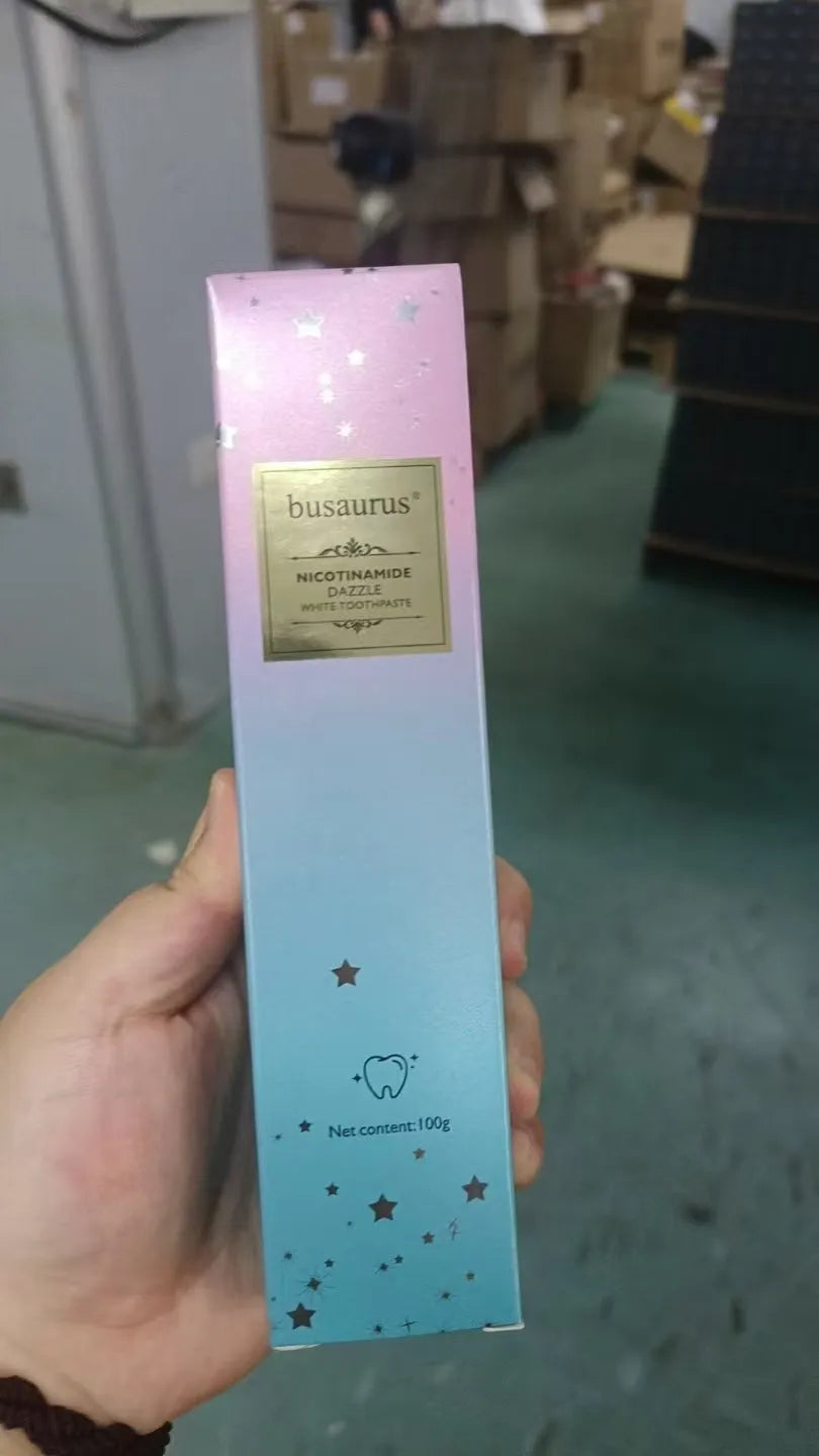 100g tube of Ji Ouni nicotinamide dazzling white toothpaste for adult whitening oral care.