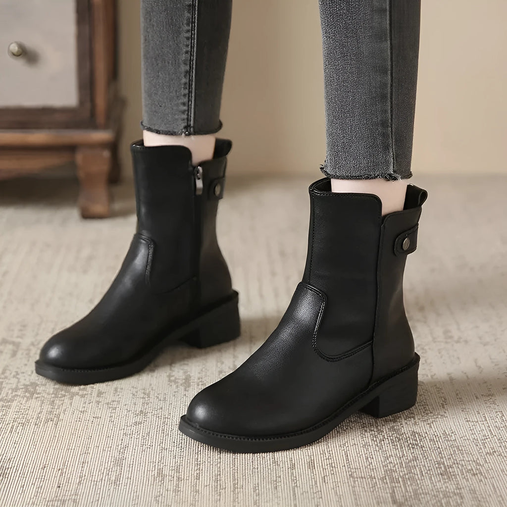 Women's black low heel ankle boots with side zip and round toe design