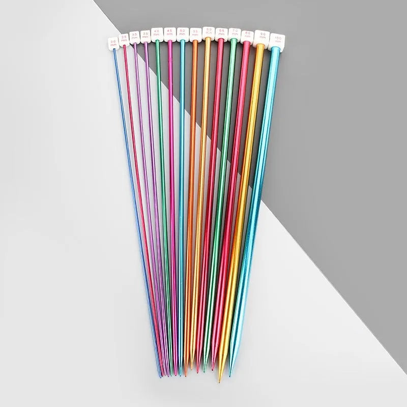 Set of crochet hooks in various sizes from 2.0mm to 9.0mm, each with a protective end cap.