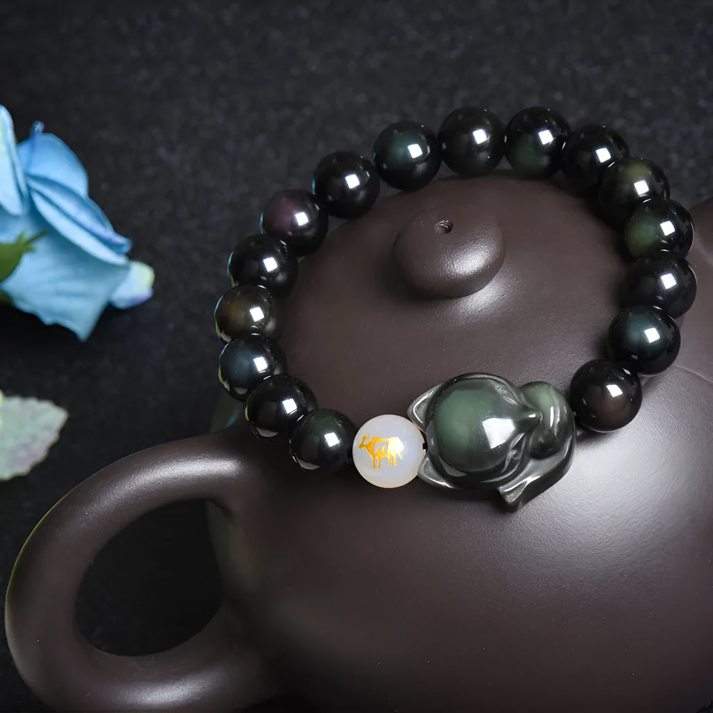 Natural obsidian bracelet with zodiac guardian design and 10mm stone beads