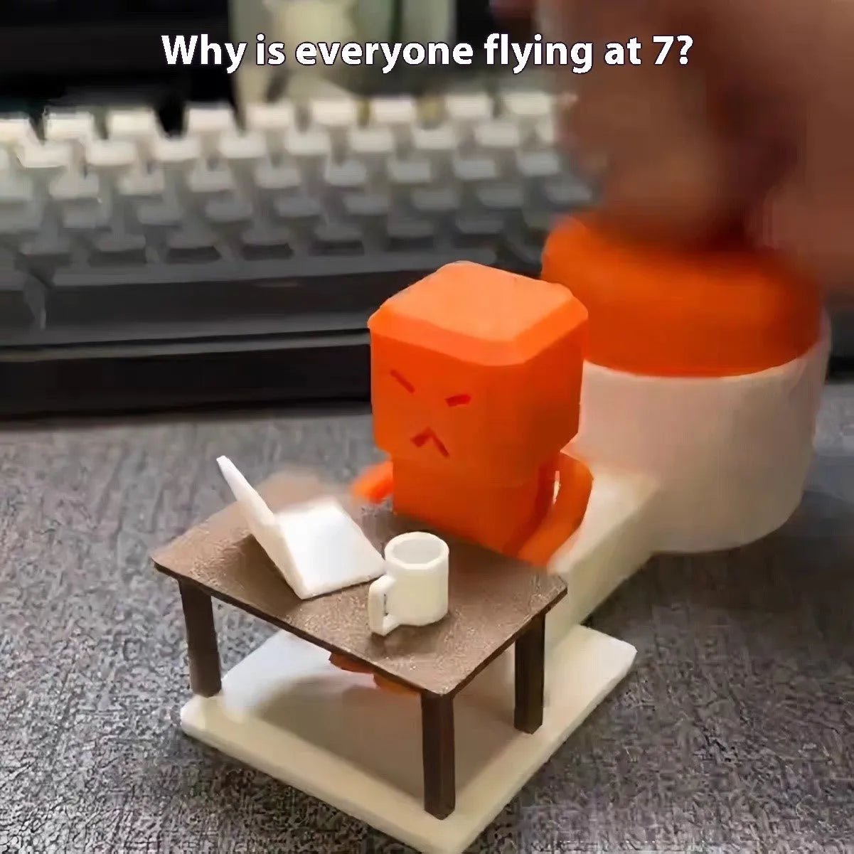 Orange plastic table-top decompression toy with turning parts