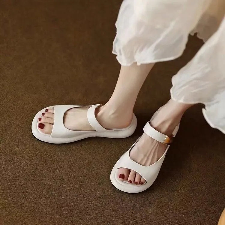Women's apricot peep toe flat platform sandals with rubber outsole showing open toe design