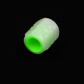 Set of four rubber luminous valve caps for car tyres on a dark background.