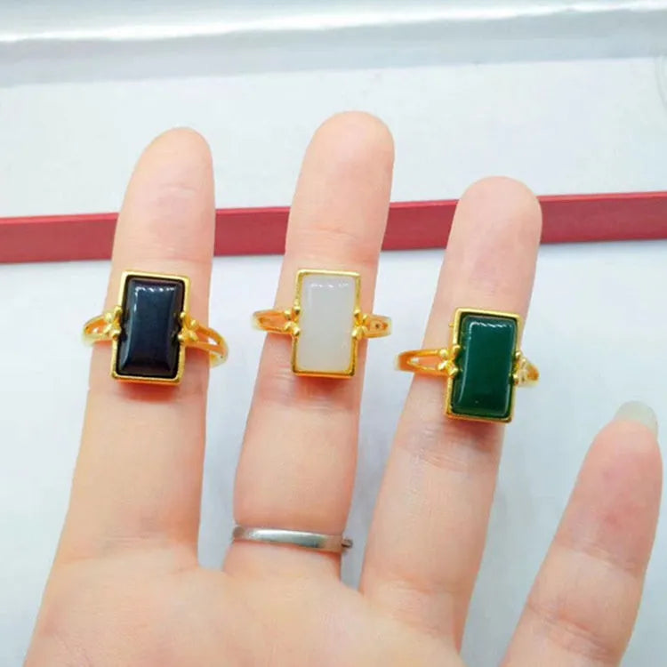 Adjustable brass gold-plated ring with electroplated gemstone in black, green or white options