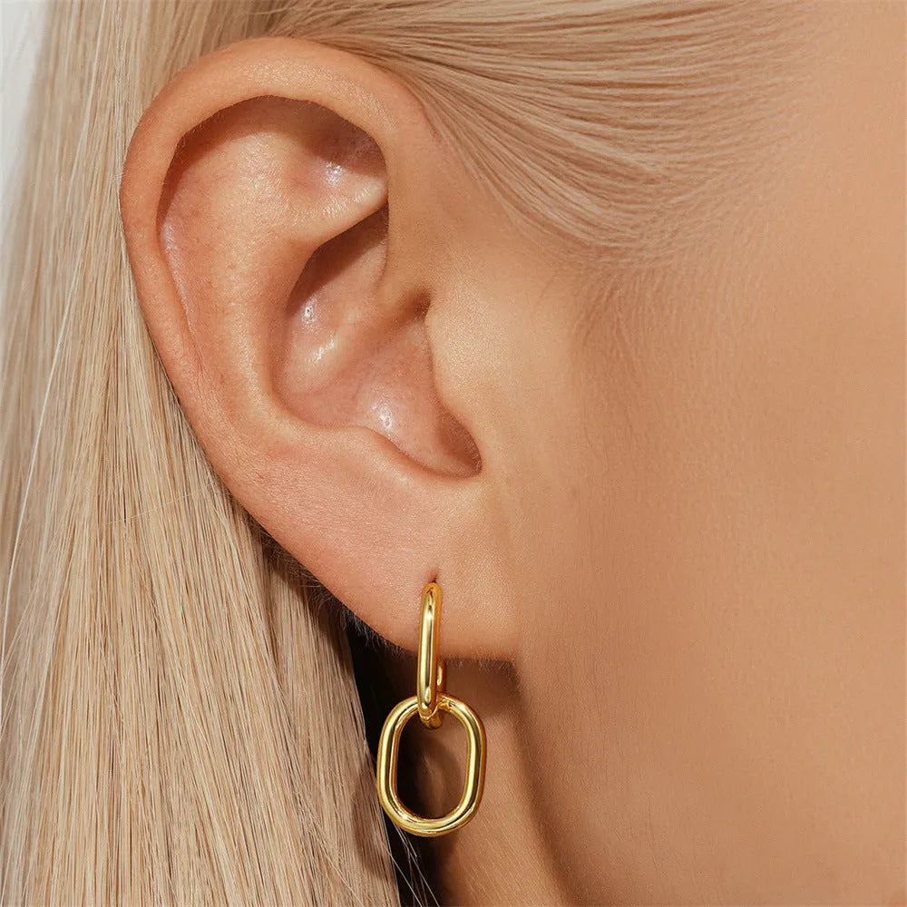 Brass diamond geometric earclip earrings with electroplated gold finish and round elements