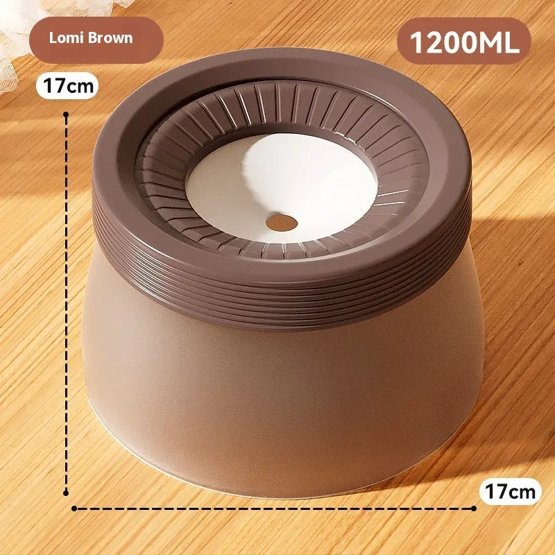 Green, blue, and brown pet suspension drinking bowl with separate base plate on a white background.