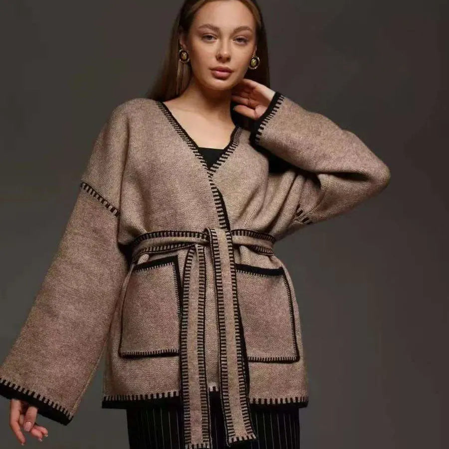 Loose fit knitted cardigan with lace-up front detail in thick imitation cashmere cotton fabric.