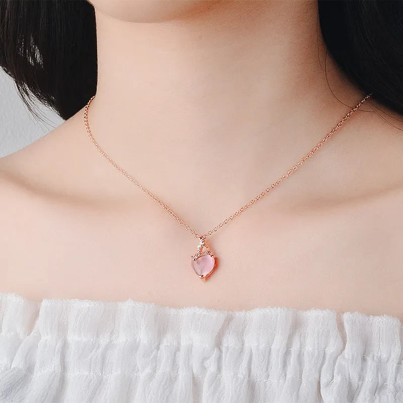 Women's heart-shaped pink crystal pendant necklace with rose gold electroplated cross chain