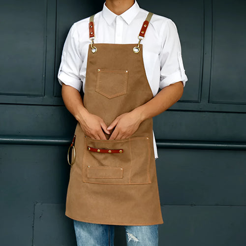 Canvas apron with cross straps in camel colour for baking and gardening work