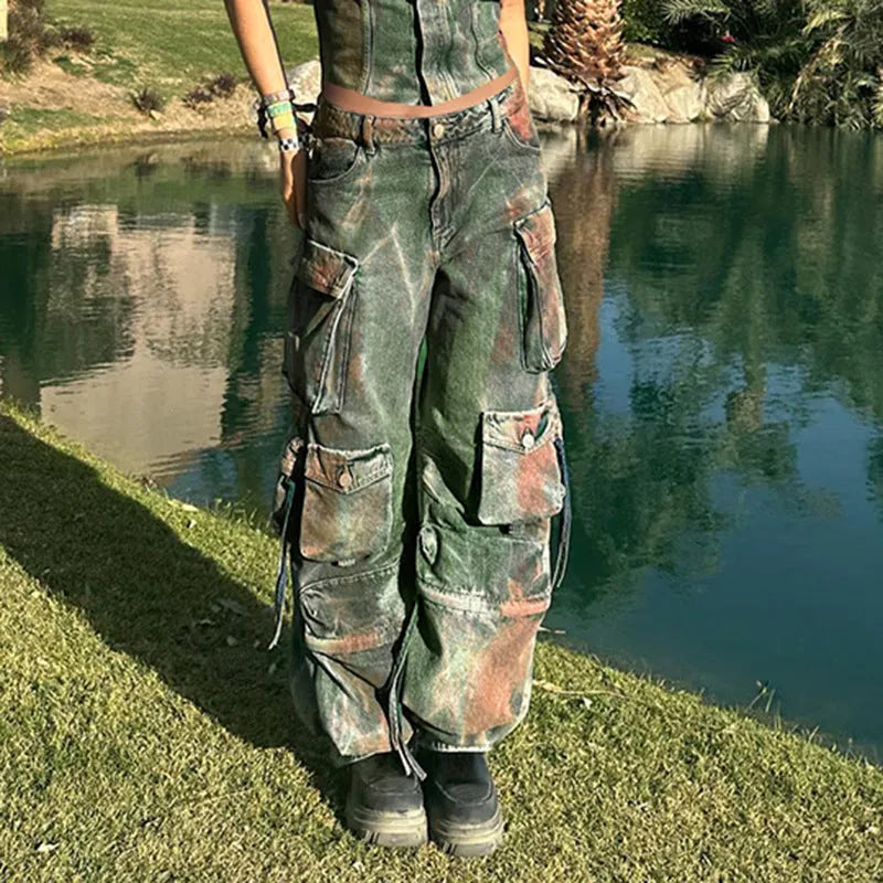Loose fit cargo denim trousers with gradient colour patch pockets and multiple storage compartments