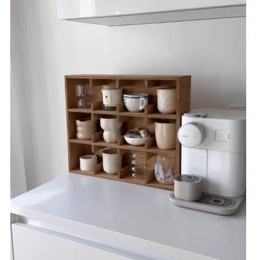 Solid wood square storage rack with multiple grid compartments in a birch wood meridian colour.