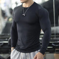 Men's white slim-fit long sleeve fitness top for running and sports activities