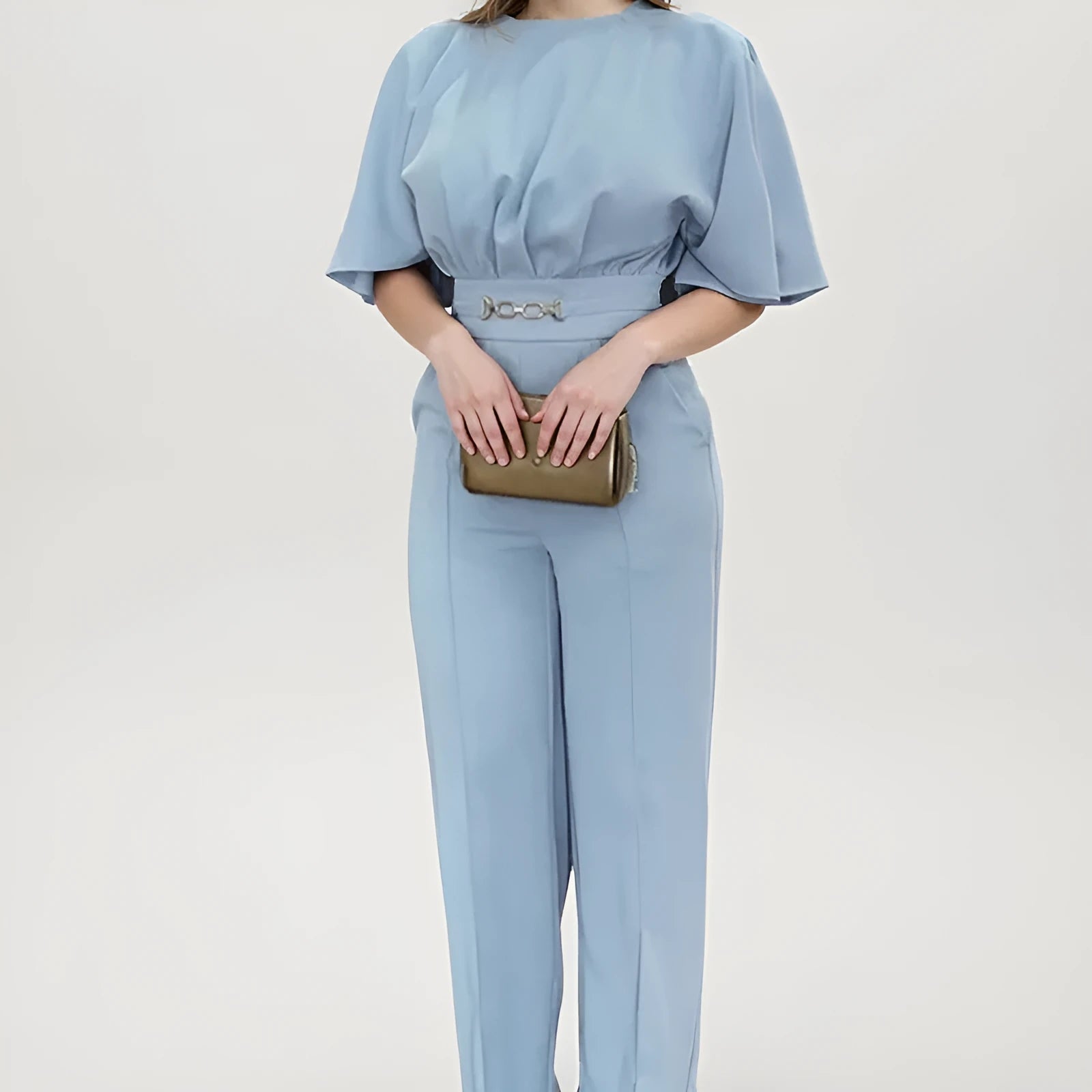 Blue men's polyester business suit with trousers and long-sleeved jacket on a hanger