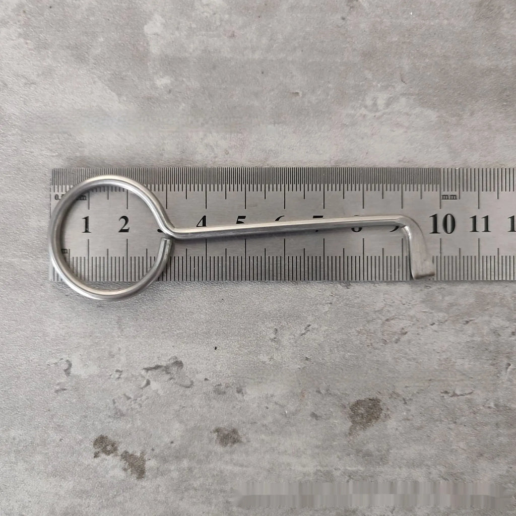 Two alloy wrench tools from a portable family maintenance set on a plain background.