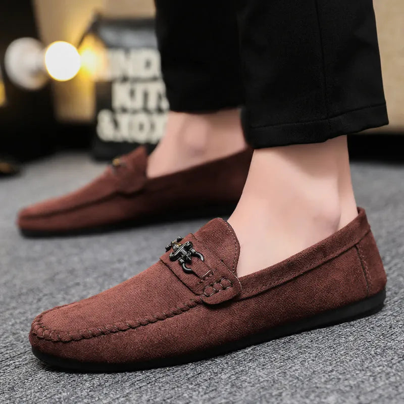 Men's waterproof slip-on loafers in artificial PU leather with rubber soles, available in black and brown colours
