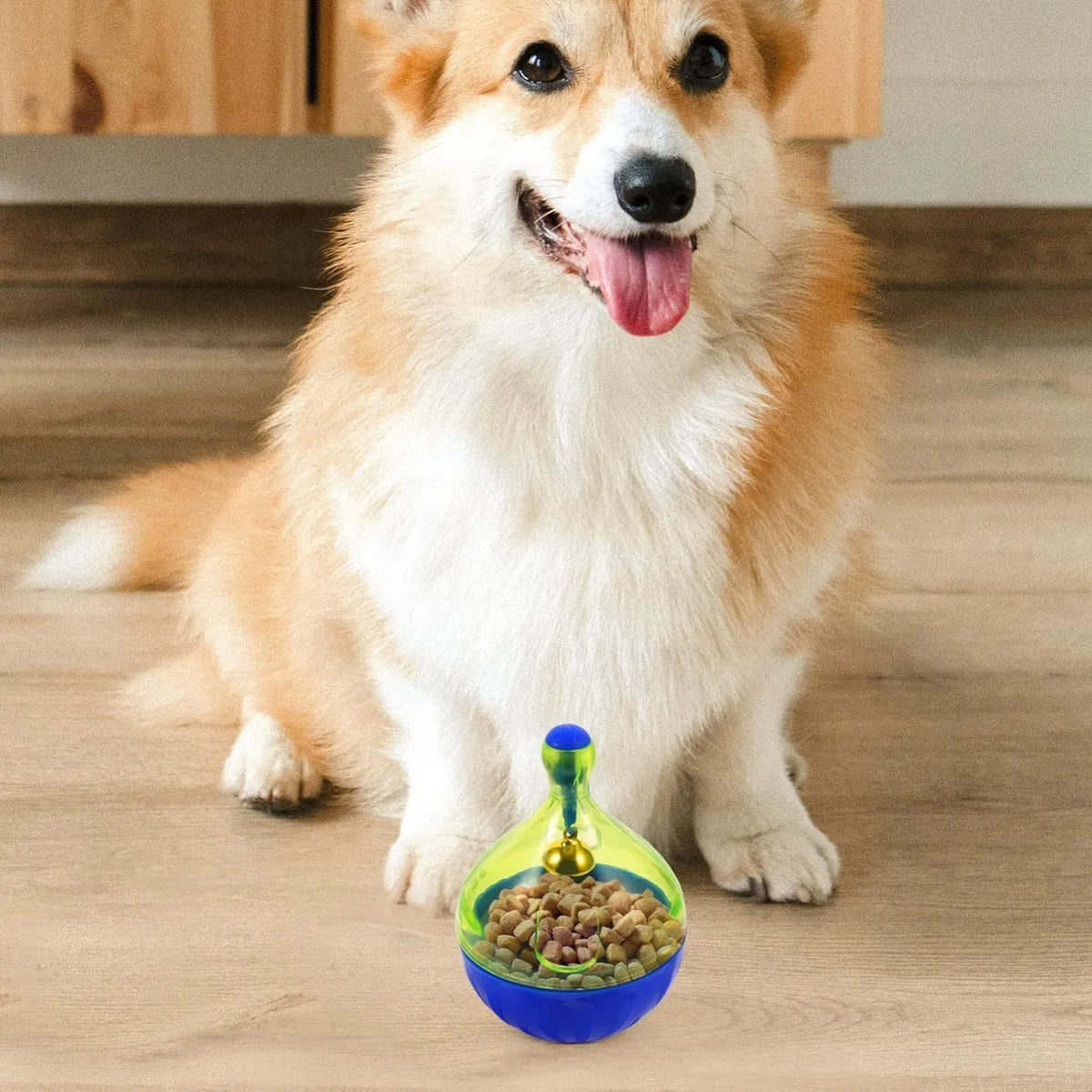 Interactive pet treat tumbler dispenser toy for dogs and cats measuring 14x10x10cm