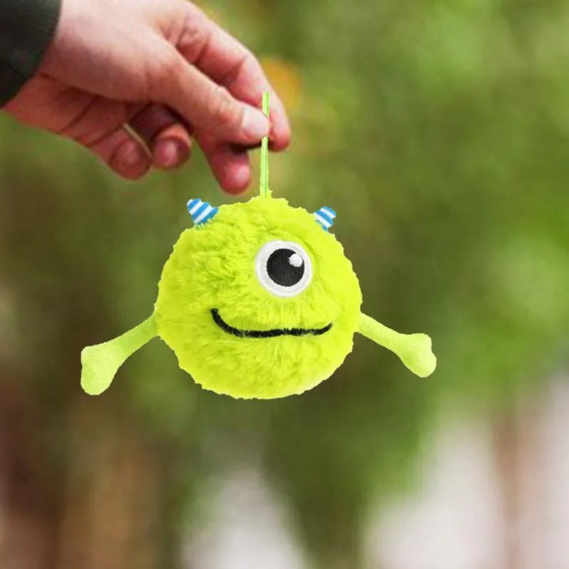 Green interactive dog toy ball with sound activation feature for teething and teeth cleaning