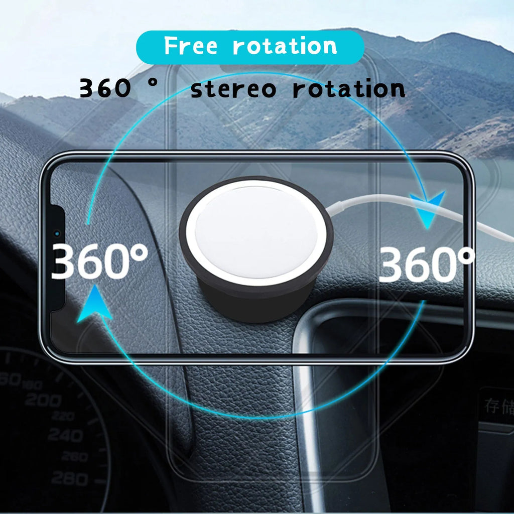 Black magnetic car phone holder mounted on air vent with smartphone attached