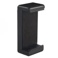 Black plastic mobile phone holder with rotating clamp on a desk