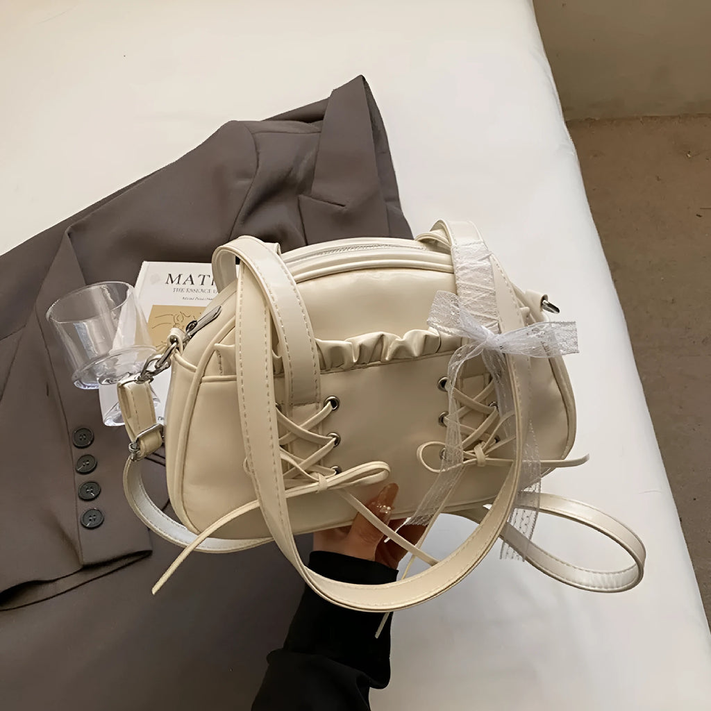 Women's bandage bow PU leather handbag with shoulder strap and internal phone compartment