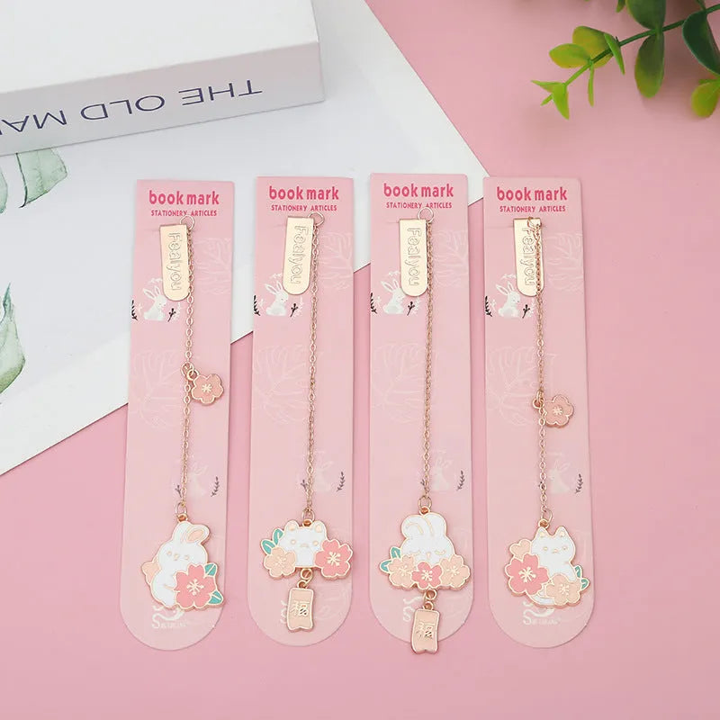 Cute cartoon metal bookmark pendant featuring a cherry cat or sakura rabbit design with sakura blossoms or a fu character.