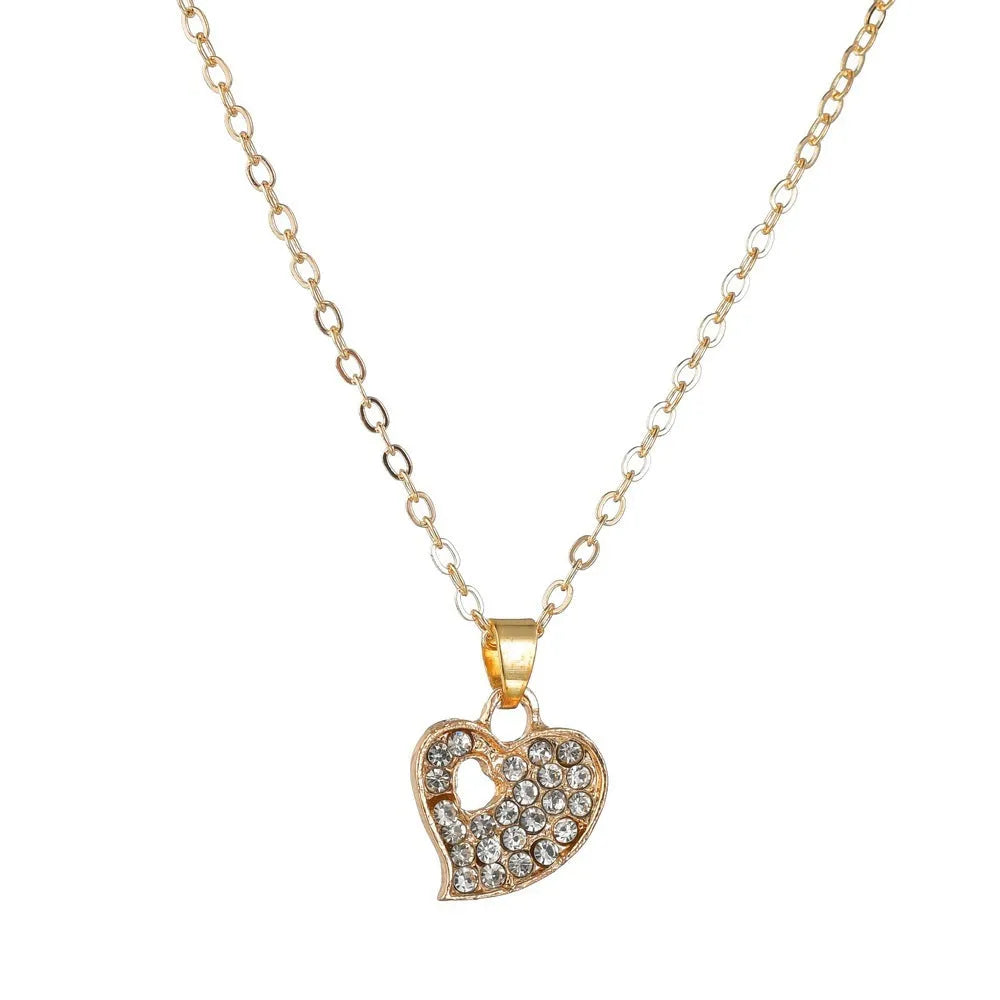 Women's gold-colour alloy jewellery set with heart, water drop and bell pendants including earrings and adjustable decorations