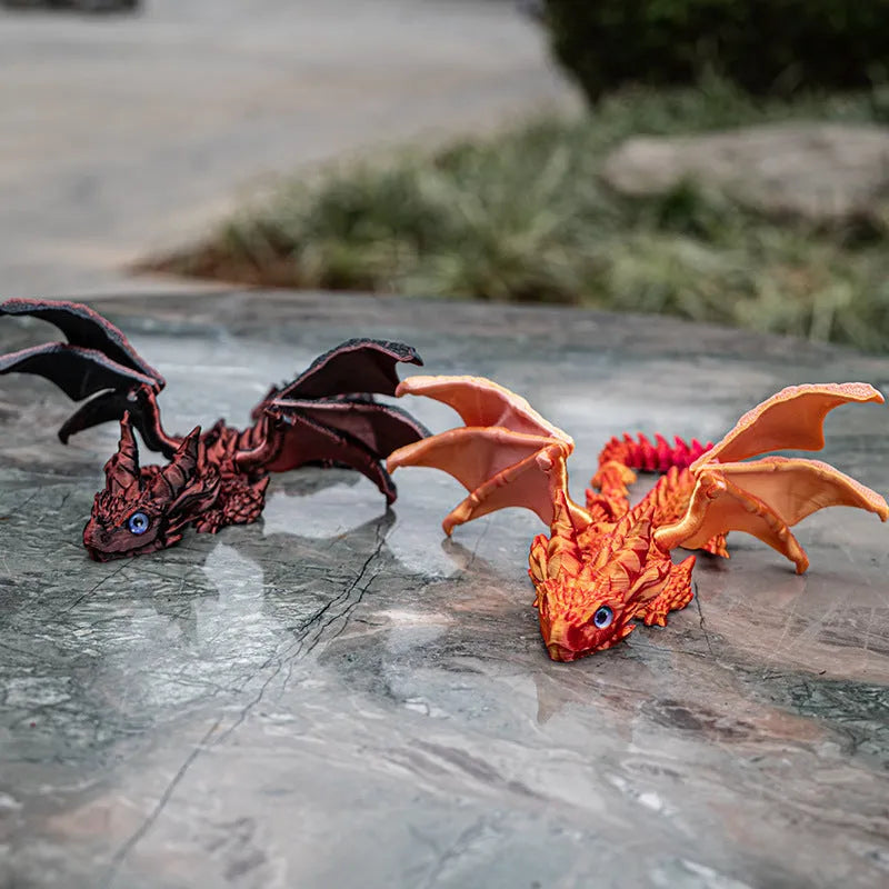 Red and gold printed dragon wings decorative toy made of PLA plastic.