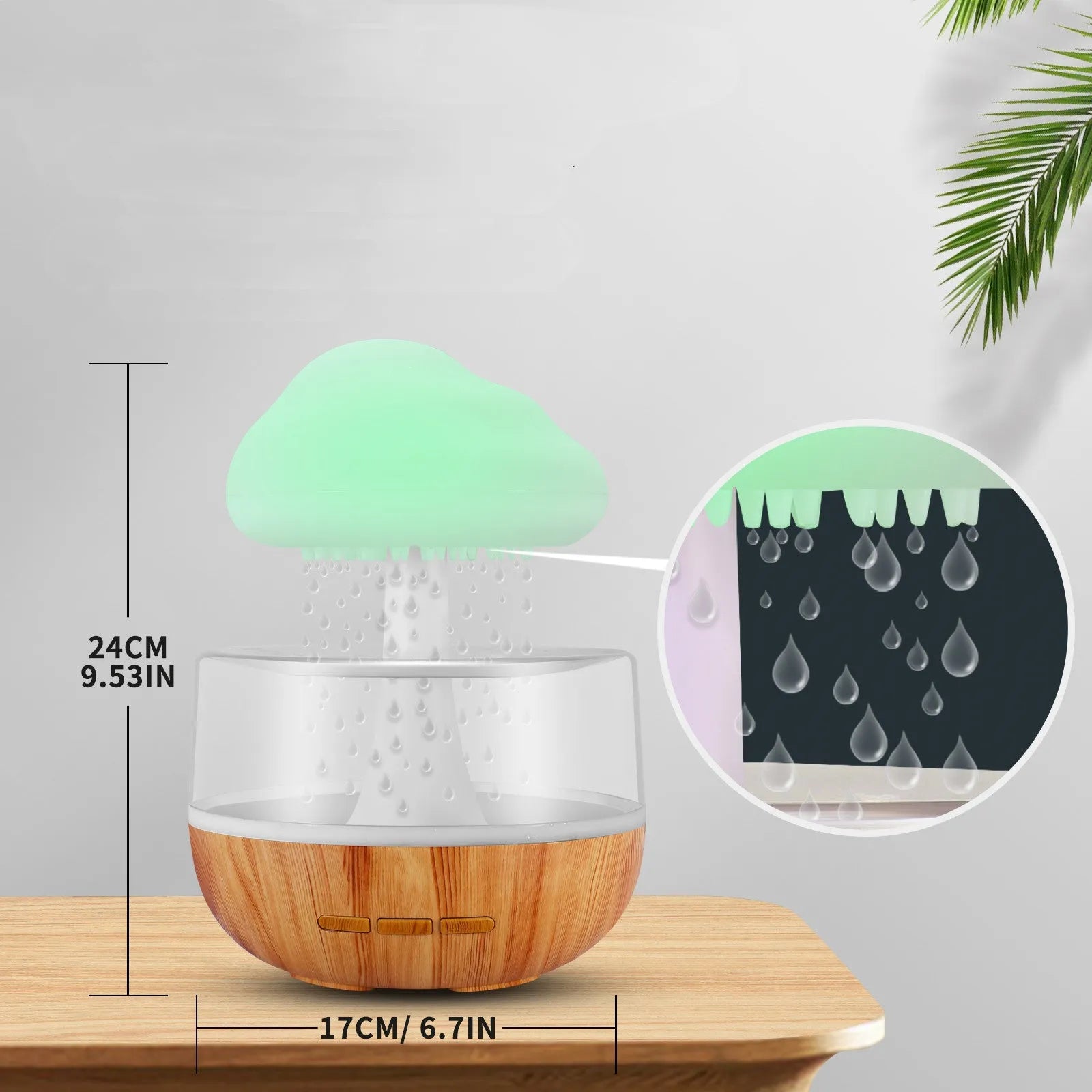 White cloud-shaped humidifier with coloured night light and mist output on a table