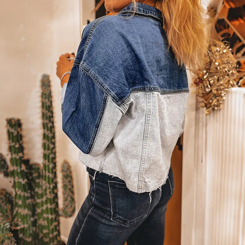 Women's denim coat with single row buckle closure in loose fit casual style