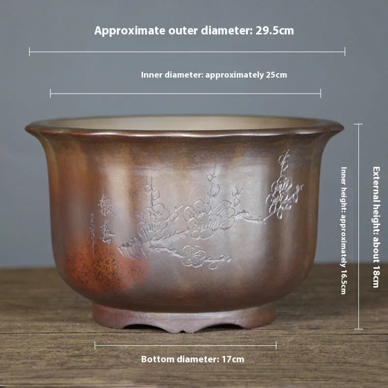 Indoor ceramic flower pot with wood burning antique carved design in purple sand clay