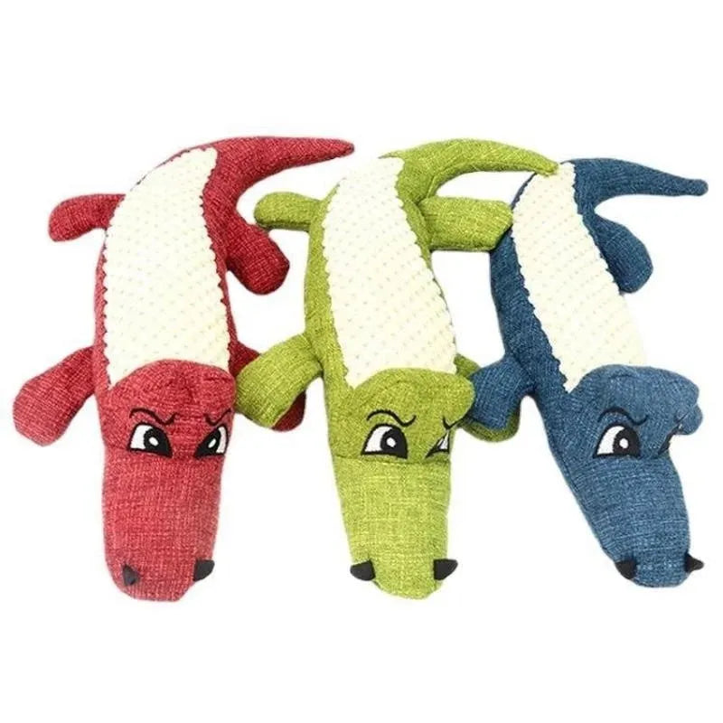 Blue, green, and red plush pet toys with a corn grid texture for chewing