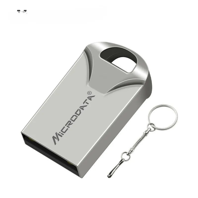 Silver metal USB flash drive on a keyring chain against a dark background